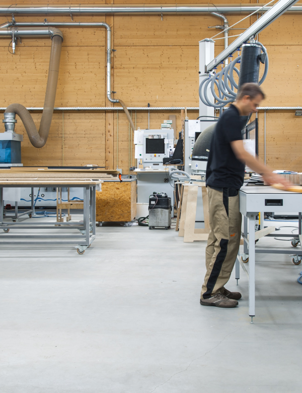 Engineer creating bathroom fittings in workshop